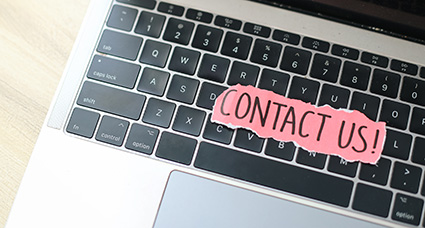 Contact-Us contact us on laptop keyboard